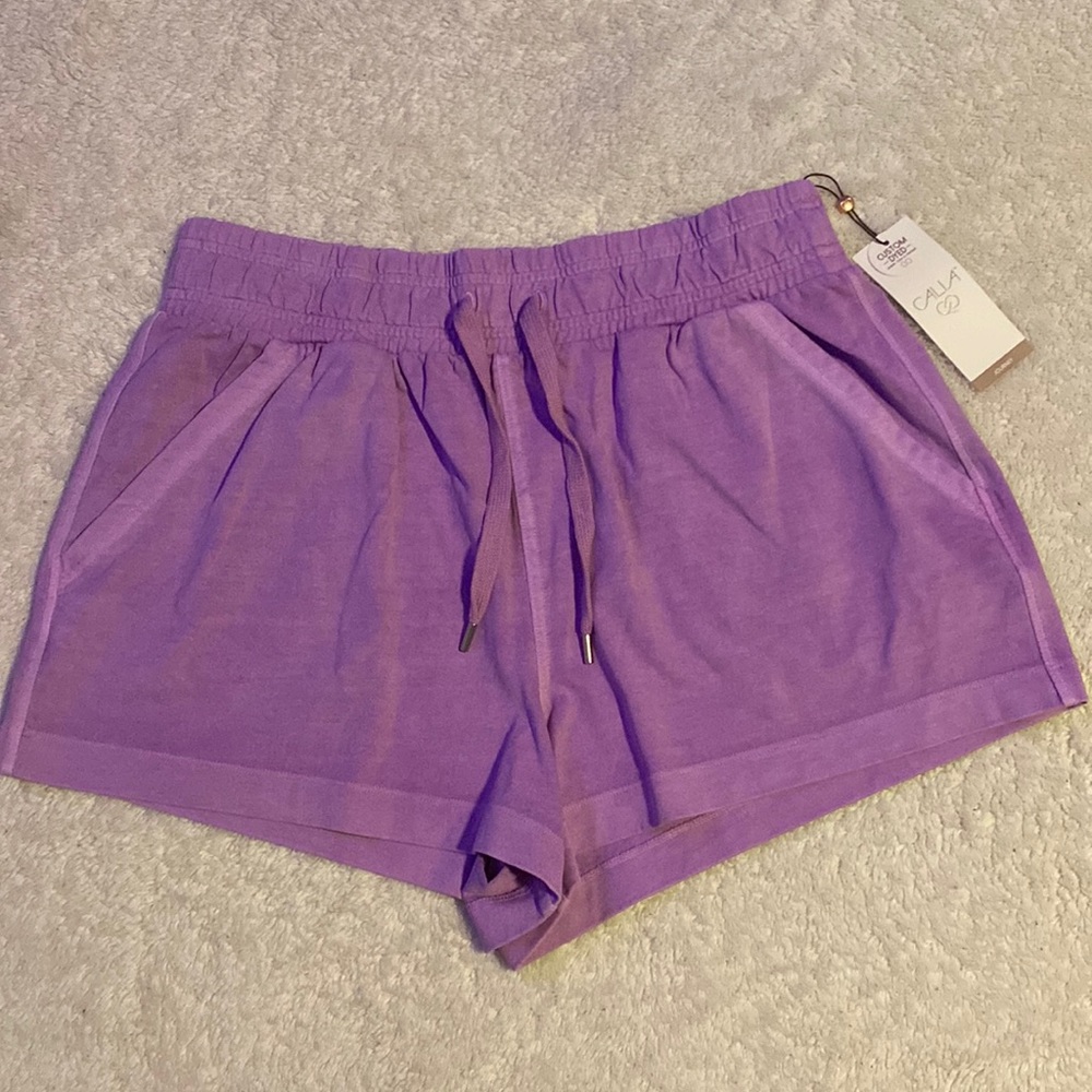 High rise, purple active shorts.